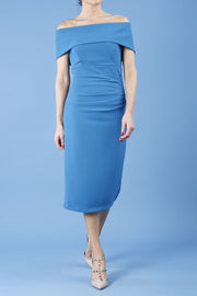 model is wearing diva catwalk amelia pencil dress with bardot neckline and ruched back in tropical teal front