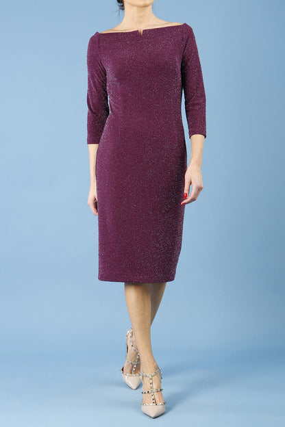 model is wearing diva catwalk neptune pencil off-shoulder dress with 3/4 sleeve in burgundy sparkle front