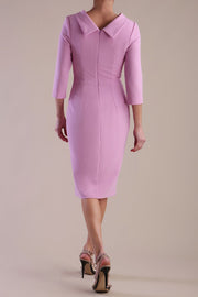 Model wearing diva catwalk Hazel pencil skirt dress with 3/4 sleeved in Dawn Pink