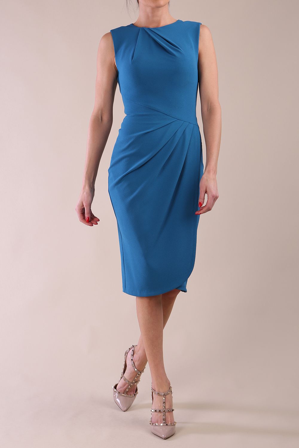 Model wearing diva catwalk Biscay Sleeveless Pleating pencil skirt dress in Tropical Teal
