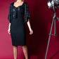 blonde model is wearing diva catwalk premiere pencil vintage sperkly dress with sleeves and empire waist in black front