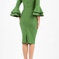 blonde model wearing diva catwalk tina pencil skirt dress with rounded neckline and flute sleeve in vineyard green back