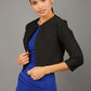 brunette model wearing diva catwalk black sleeved bolero over a royal blue pencil dress front