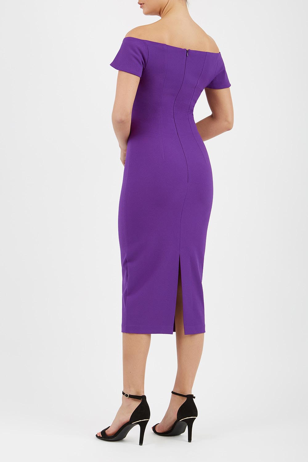 brunette model wearing diva catwalk juilet midaxi pencil sleeveless off shoulder dress with open neck and folded collar in colour passion purple back