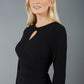 A blonde model is wearing a 3/4 sleeve pencil dress with the keyhole details in black front image