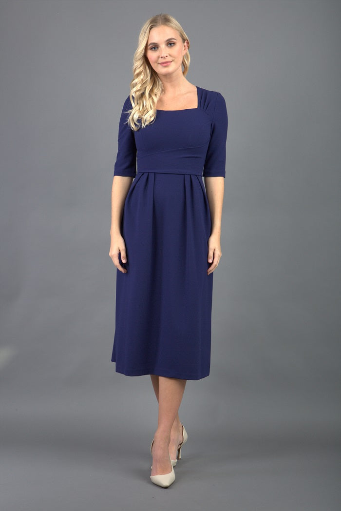 model is wearing diva catwalk mimi maxi sleeved dress with square neckline in navy blue front