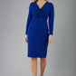 Gately Long Sleeve Twisted Low V-Neck Pencil Dress 