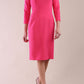 Model wearing diva catwalk Helium Sleeved pencil skirt dress in Fuchsia Pink