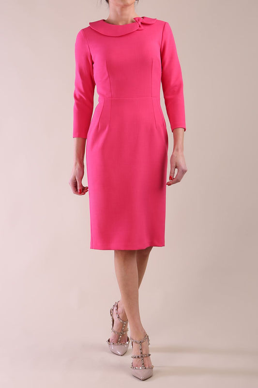 Model wearing diva catwalk Helium Sleeved pencil skirt dress in Fuchsia Pink