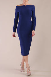 Model wearing DIVA Catwalk Faye Off Shoulder Long Sleeve Midi Pencil Dress in Navy Blue colour front