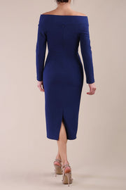 Model wearing DIVA Catwalk Faye Off Shoulder Long Sleeve Midi Pencil Dress in Navy Blue colour back