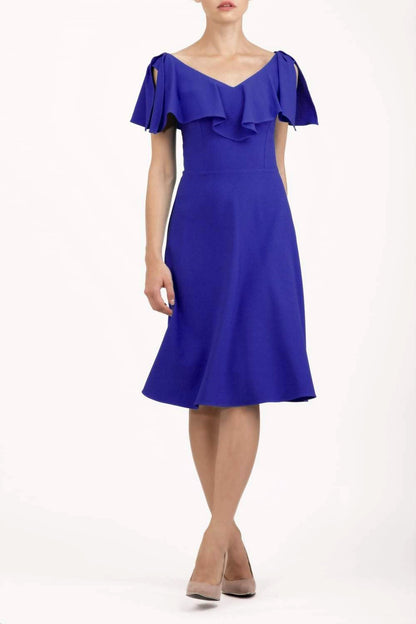 model is wearing diva catwalk layla plain a-line swing dress in indigo front