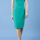 blonde model is wearing diva catwalk mariposa pencil dress with Detailed Bardot neckline with fold-over detail and pleated at waist area in aqua green front