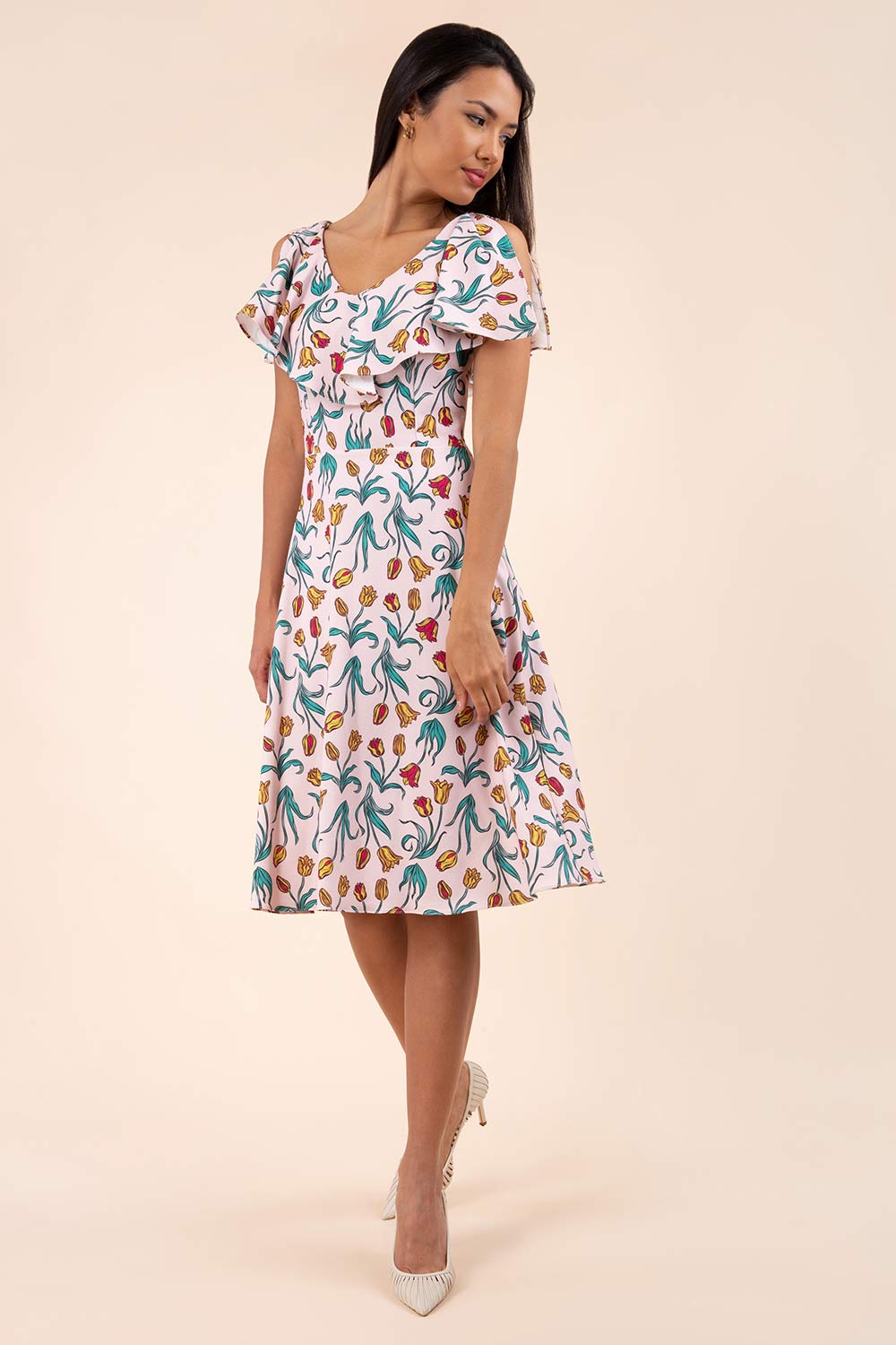 model is wearing diva catwalk layla a-line swing printed dress without sleeves in linear tulip print front