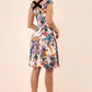 model wearing a diva catwalk Shayla Swing Dress sleeveless swing skirt dress in rainforest print colour back