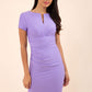 model wearing diva catwalk donna pencil dress in colour lilac with wide band and sleeves and rounded neckline with low split in front