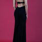 Model wearing Afterdark Full Length Sleeveless Open U-shape Back and Cowl neckline Dress with and Sequined straps over neckline and back in Black back