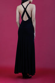 Model wearing Daring Full Length Sleeveless Open U-shape x-cross detailed Back  and Cowl neckline Dress in Black back