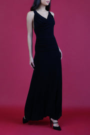 Model wearing Daring Full Length Sleeveless Open U-shape x-cross detailed Back  and Cowl neckline Dress in Black front