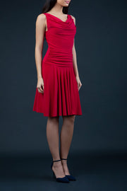 Model Wearing ChaCha Sleeveless Swish Skirt A-Line Mini Dress with pleating across the body in Red front