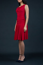 Model Wearing ChaCha Sleeveless Swish Skirt A-Line Mini Dress with pleating across the body in Red front