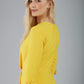 blonde model is wearing diva catwalk logan round neck sleeved pencil dress with side arrow pleating detail in daffodil yellow back