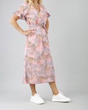 blonde model is wearing diva catwalk carella short sleeve printed midi dress with a belt in pink floral print front