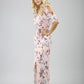 model is wearing diva catwalk maxi summer dress with short sleeve and a belt detail in pale pink print front