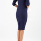 model is wearing diva catwalk seed amalfi plain pencil dress with high v-neck and sleeves in navy blue back