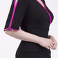 Model wearing the Diva Andorra Pencil dress with V neckline in black and fuchsia front image