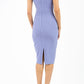 Model wearing the Diva Banbury gathered dress in bodycon pencil dress design in vista blue back