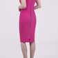 Model wearing the Diva Carolina Colour block dress with contrast colour neck detail in hibiscus fushia and black back image