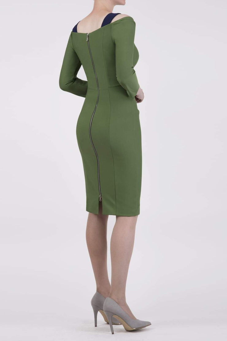 Model wearing the Diva Carolina ¾ sleeve Dress with cut out neckline detail in vineyard green and navy back image