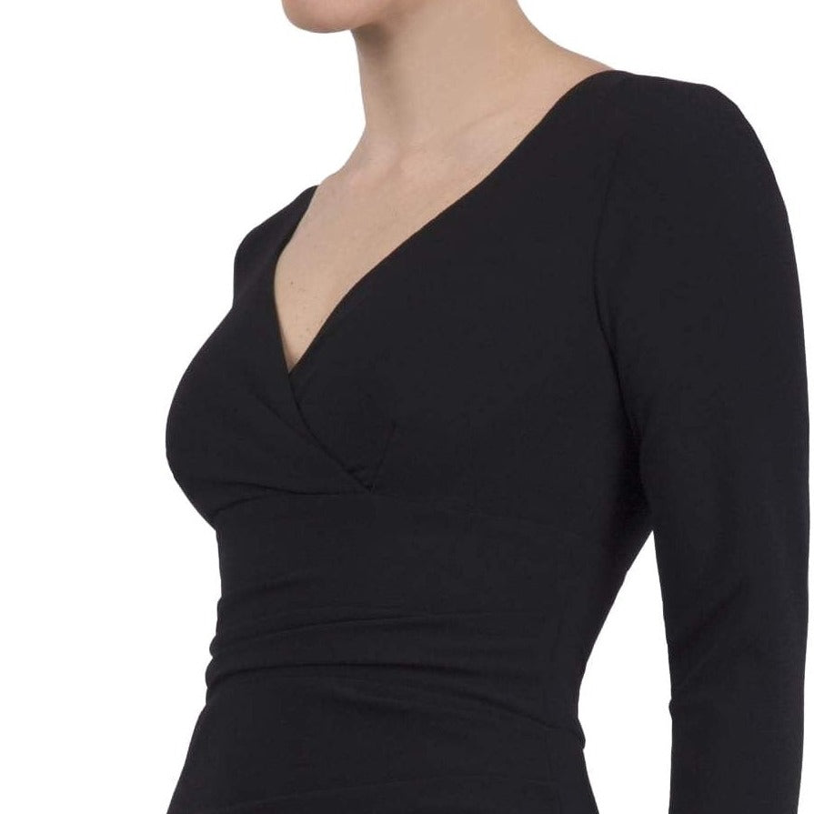 model is wearing diva catwalk cynthia long sleeve pencil dress with low v-neckline in black front