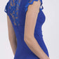 Model wearing the Diva Athens lace pencil dress with gathered lace trim around the neck and shoulder edges in riviera blue back image  