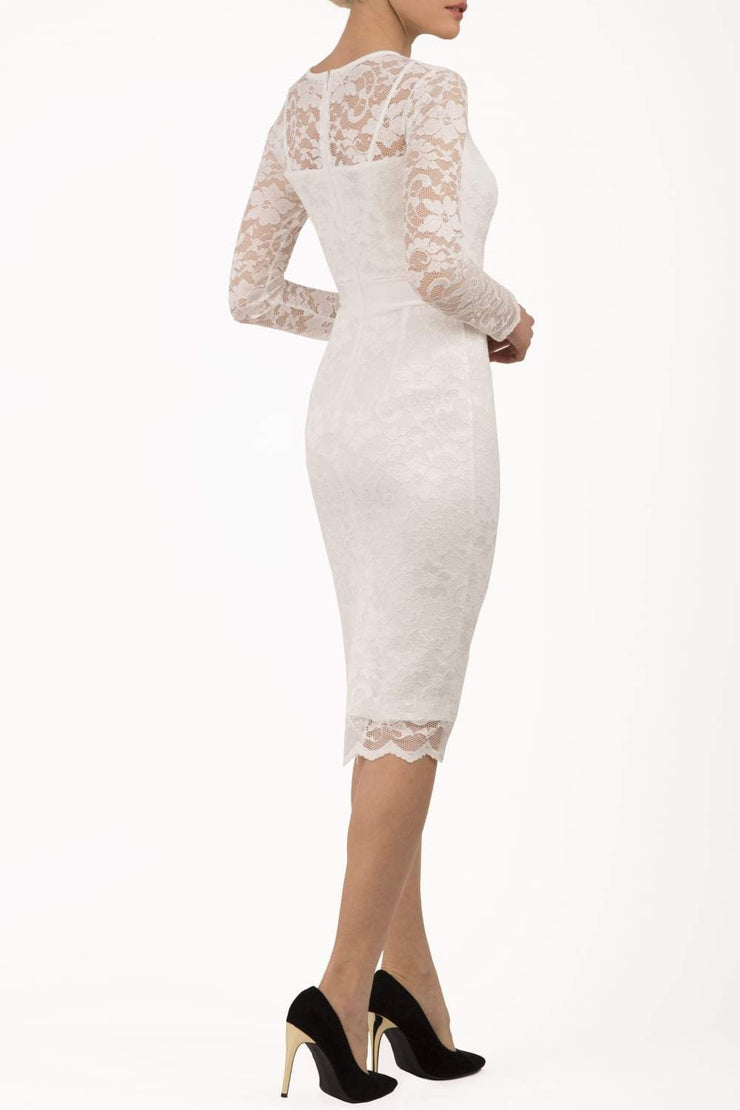 Model wearing the Diva Cherrie Lace Pencil dress with long sleeves and round neck in ivory cream back image