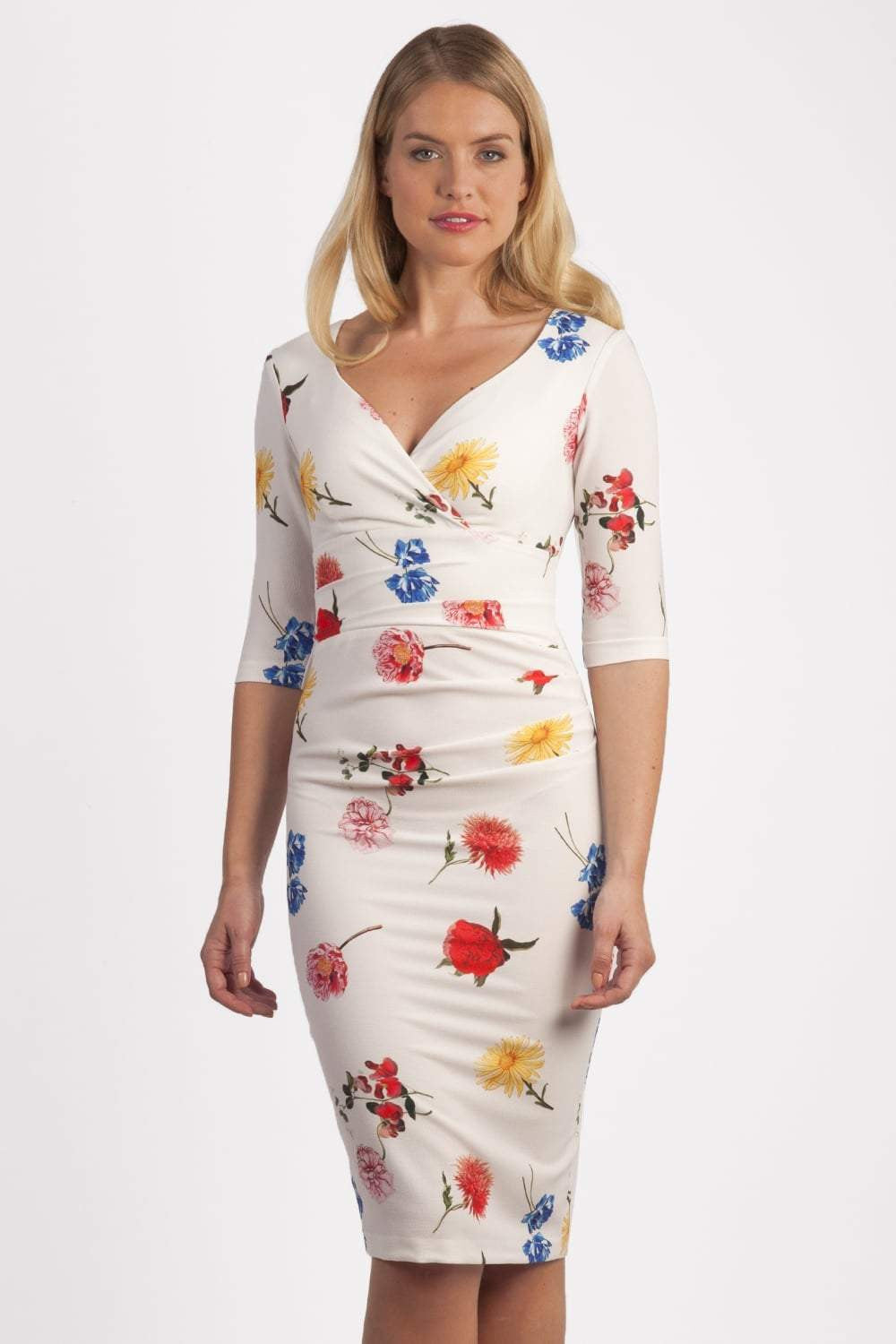 Model wearing the Diva Cynthia Floral Print dress with pleating across the front in Buttercup print front image