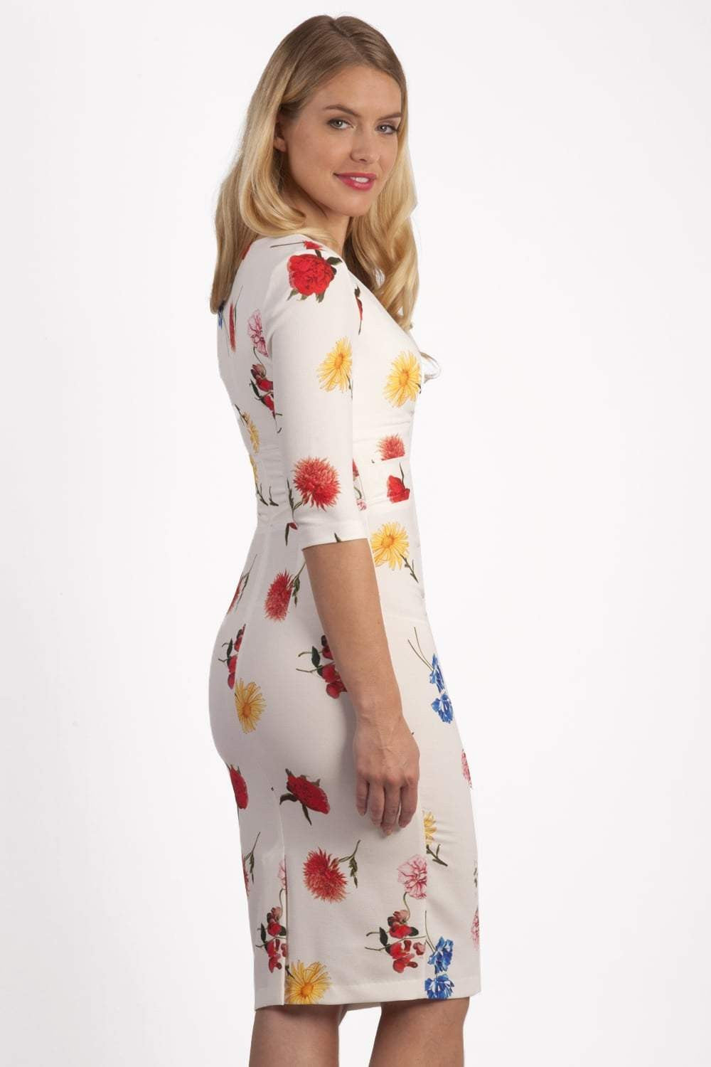 Model wearing the Diva Cynthia Floral Print dress with pleating across the front in buttercup print front image