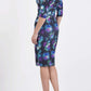 Model wearing the Diva Cynthia Floral Print dress with pleating across the front in Floral splash print back image