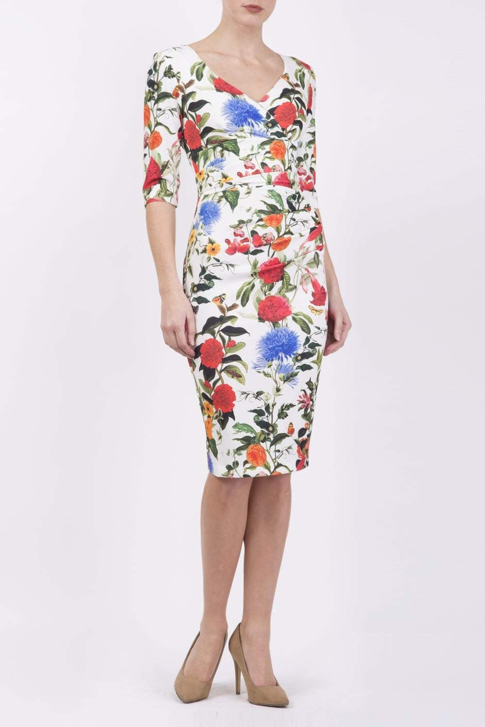 Model wearing the Diva Cynthia Floral Print dress with pleating across the front in Eden print front