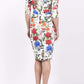 Model wearing the Diva Cynthia Floral Print dress with pleating across the front in Eden print back image