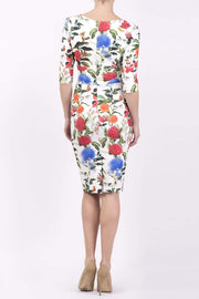 Model wearing the Diva Cynthia Floral Print dress with pleating across the front in Eden print back image