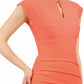 model wearing diva catwalk daphne sleeveless peach pencil dress with rounded neckline with split in the middle in front