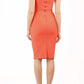 model wearing diva catwalk daphne sleeveless peach pencil dress with rounded neckline with split in the middle in back