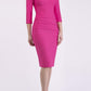 Model wearing the Diva Daphne ¾ Sleeved dress with pleat detail across the hips and ¾ sleeve length in hibiscus pink front