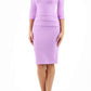 Model wearing the Diva Daphne ¾ Sleeved dress with pleat detail across the hips and ¾ sleeve length in violet bloom front