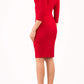 model wearing diva catwalk donna pencil dress in colour red with wide band and sleeves and rounded neckline with low split in front back