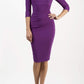 model wearing Diva Catwalk pencil three quarter sleeve dress with a split neckline and pleating across the tummy in violet purple front
