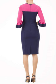 Model wearing the Diva Lyonia Pencil dress in pencil dress design in navy blue and fucshia pink front image