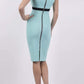 brunette model wearing diva catwalk nadia sleeveless pencil dress in mint green colour with a contrasting black band and exposed zip at the back with a rounded neckline with a slit  in the middle back